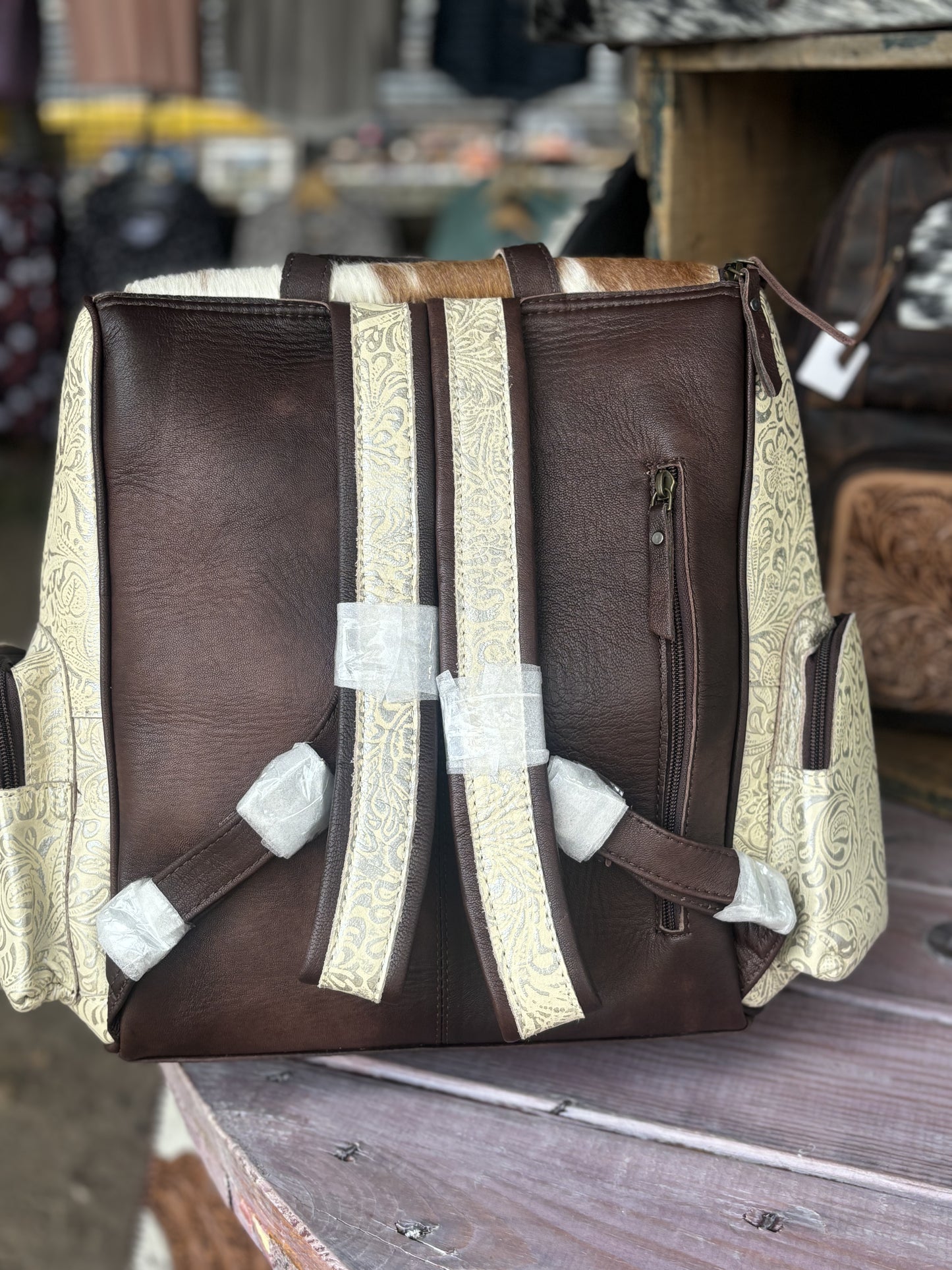 Cowhide Creme Tooled Backpack