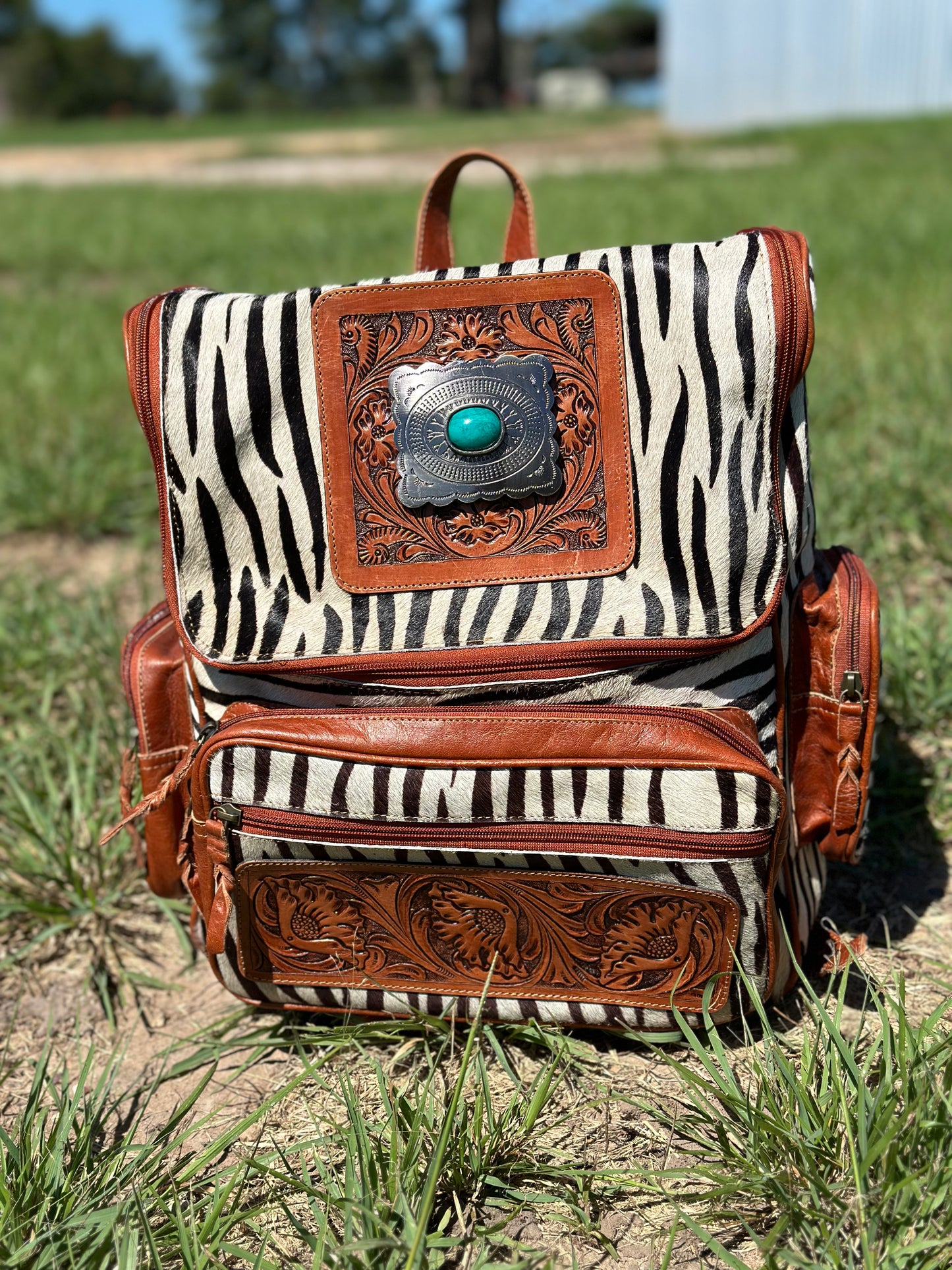 Zebra Concho Buckle Backpack