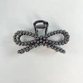 Faux Navajo Pearl Bow Claw Clip