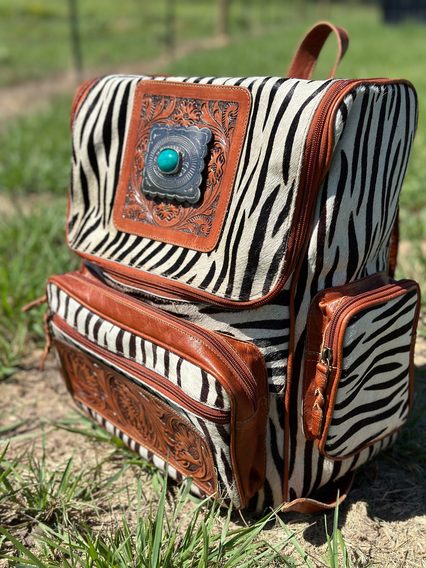 Zebra Concho Buckle Backpack