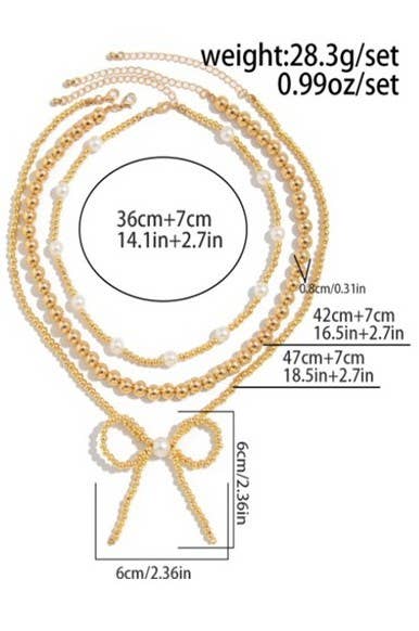 MULTILAYER GOLD PEARL BOW NECKLACE